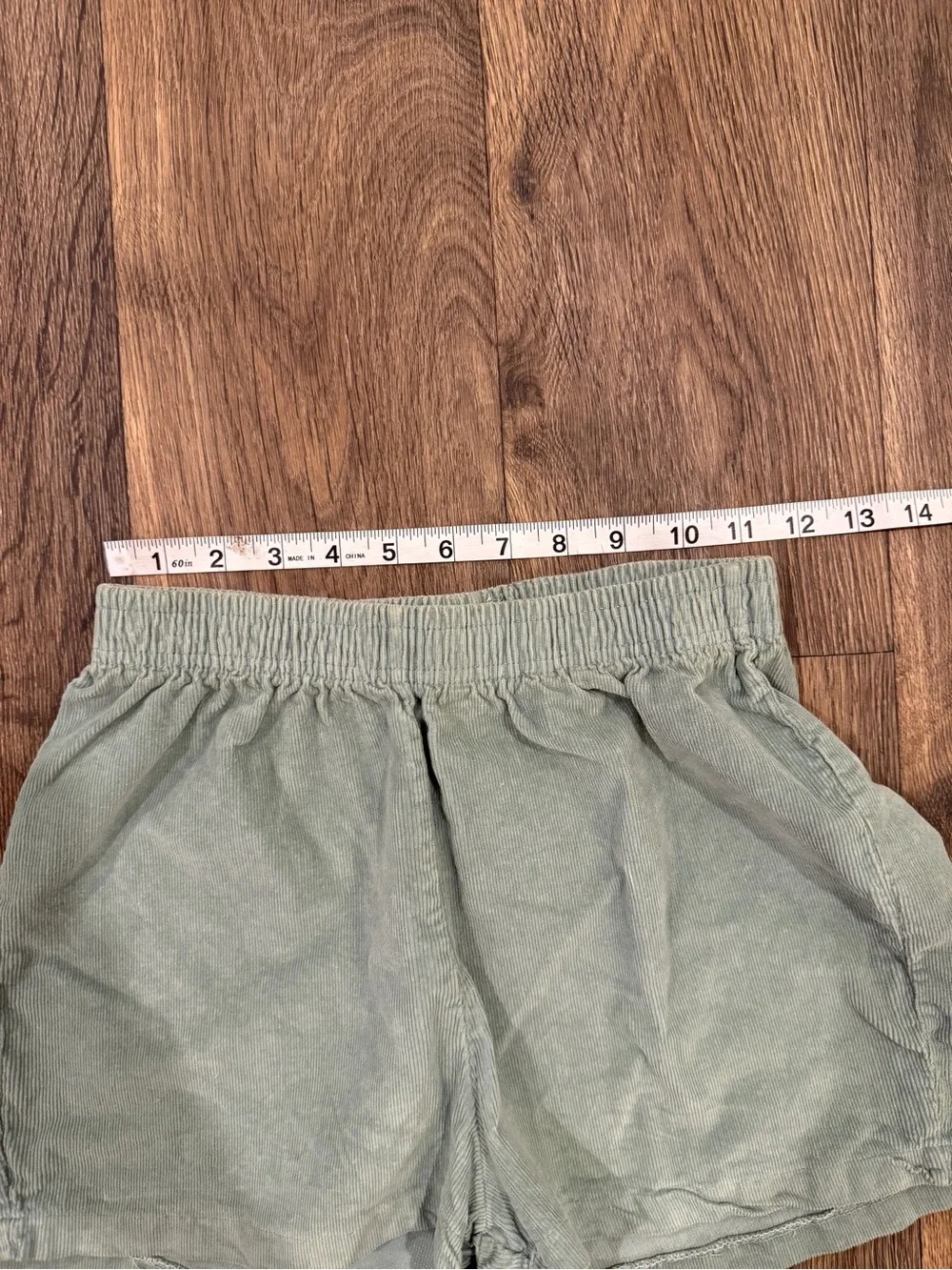 Green corduroy shorts